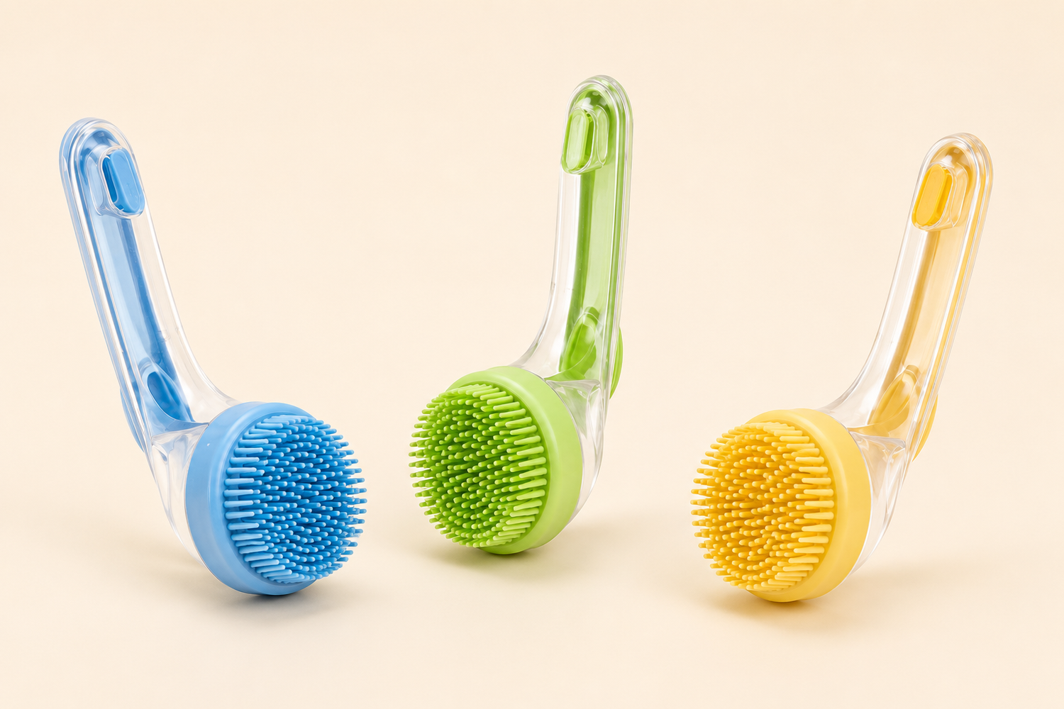 FoamyPaw bath brushes in blue green and yellow