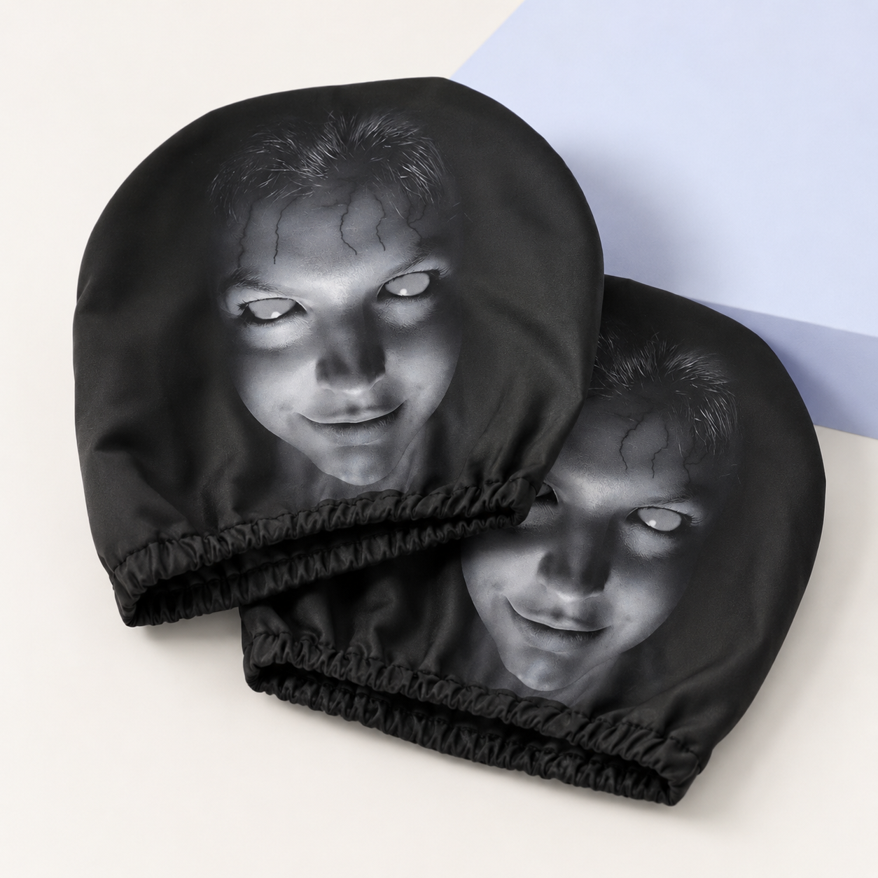 Two Pione ScareSeat headrest covers arranged as a matching two-piece set